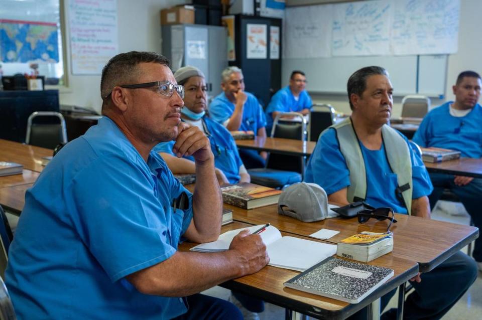 Enrique Sandoval, Daniel Arciniega and Eleazar Alicantar learn English language skills in class at San Quentin State Prison on Wednesday.