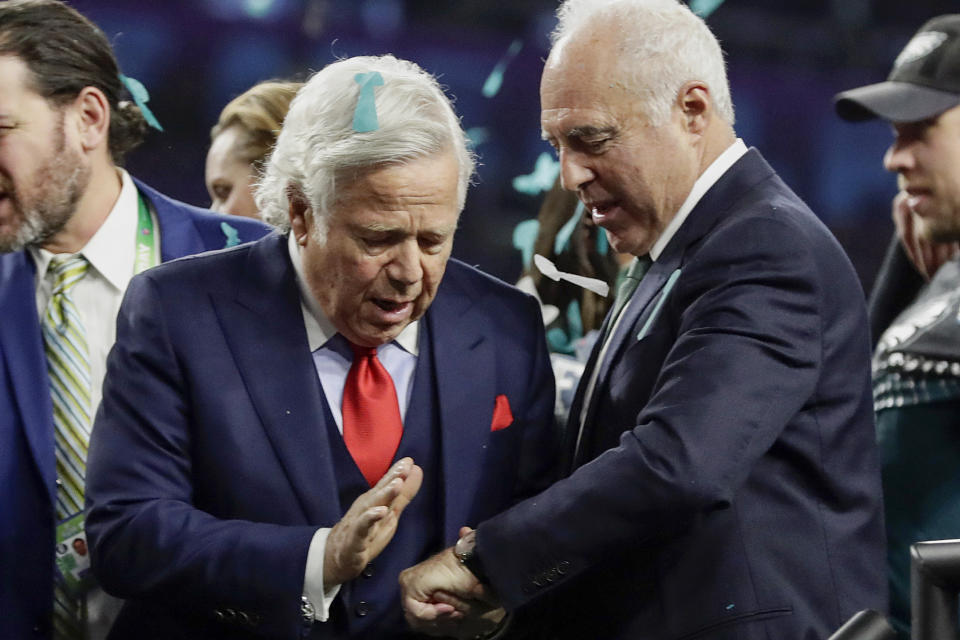 Patriots owner Robert Kraft (L) congratulates Eagles owner Jeffrey Lurie, after the Eagles won Super Bowl LII. The pair were critical of President Donald Trump during an October meeting between NFL owners and players. (AP)