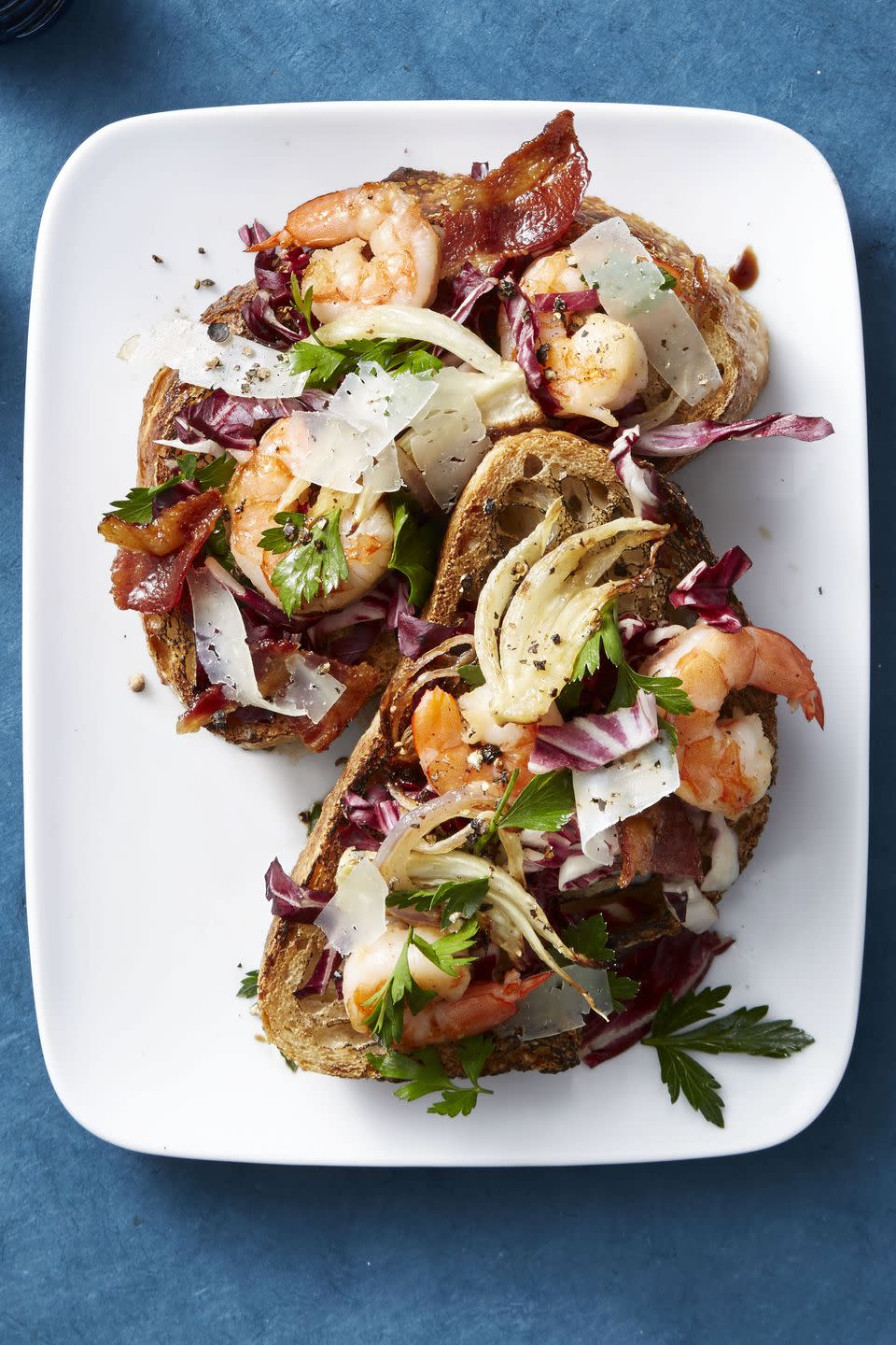 <p>Salad on toast?! Well, life is all about balance. </p><p><em><a href="https://www.goodhousekeeping.com/food-recipes/easy/a46932/radicchio-salad-with-roasted-fennel-and-shrimp-recipe/" rel="nofollow noopener" target="_blank" data-ylk="slk:Get the recipe »" class="link rapid-noclick-resp">Get the recipe »</a></em> </p>