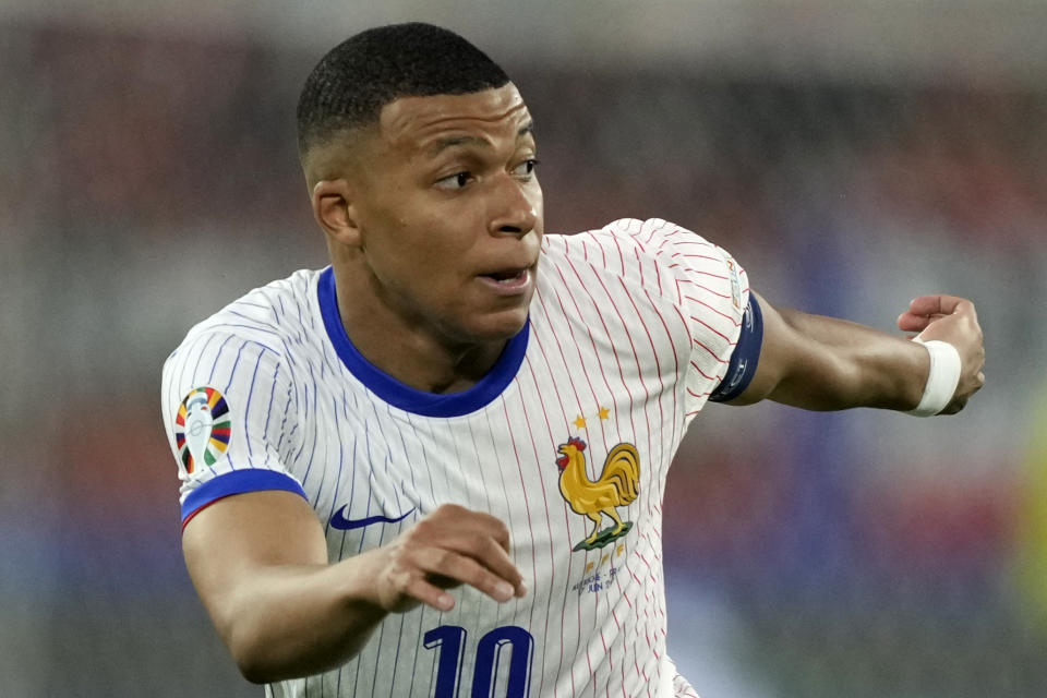 Kylian Mbappe of France runs during a Group D match between Austria and France at the Euro 2024 soccer tournament in Duesseldorf, Germany, Monday, June 17, 2024. (AP Photo/Martin Meissner)