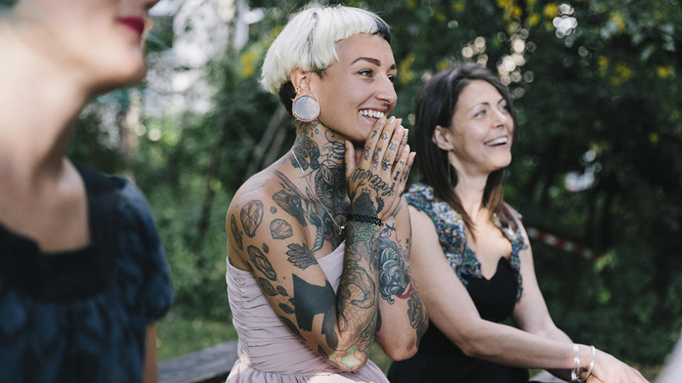 Wedding guest maid of honour with tattoos