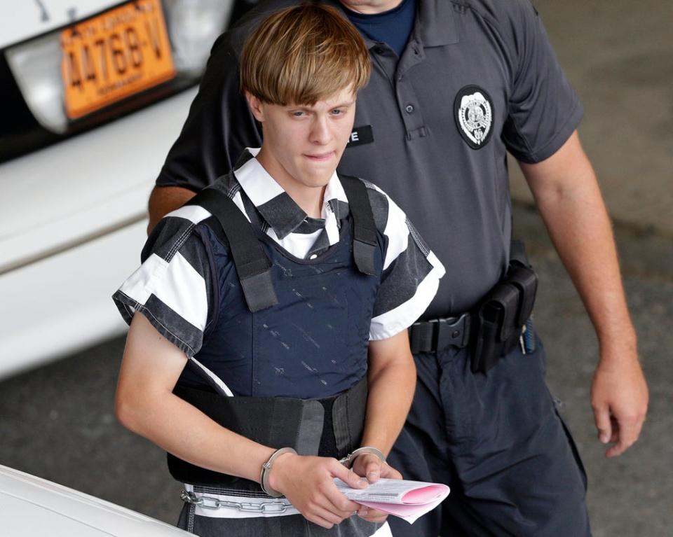 Dylann Storm Roof is escorted from the Cleveland County Courthouse in Shelby, North Carolina, on 18 June, 2015 (Copyright 2016 The Associated Press. All rights reserved.)