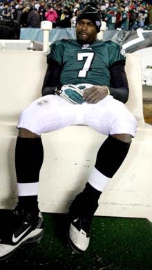 Michael Vick sits on the bench after losing to the Packers 21-16 on Sunday