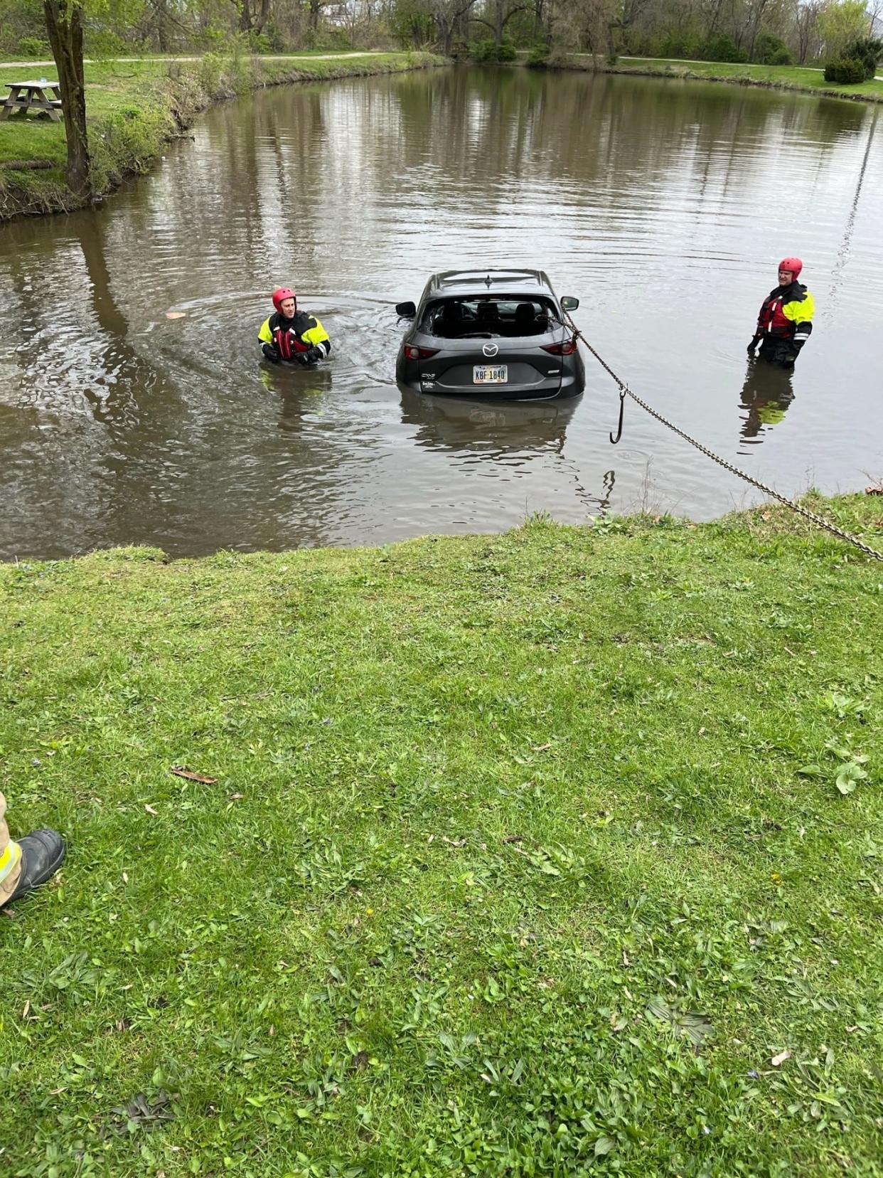 The Canton Fire Department water rescue team responded to Cook's Lagoon on Sunday morning to a report of an SUV submerged in the pond. There was no one in the vehicle, which had been reported stolen Saturday in Plain Township.