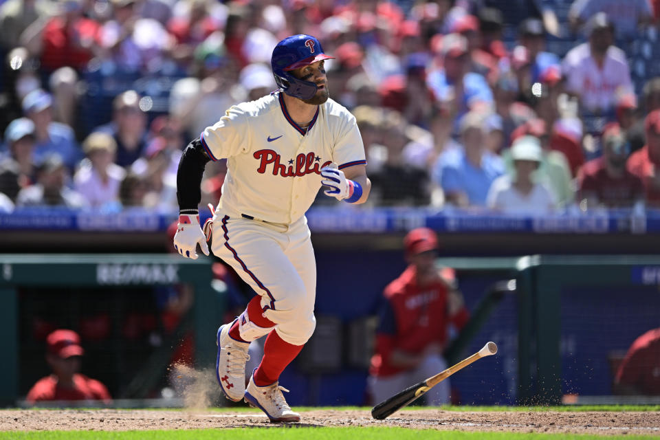 Philadelphia Phillies' Bryce Harper watches the ball after hitting a double off Los Angeles Angels starting pitcher Patrick Sandoval during the fifth inning of a baseball game, Sunday, June 5, 2022, in Philadelphia. (AP Photo/Derik Hamilton)