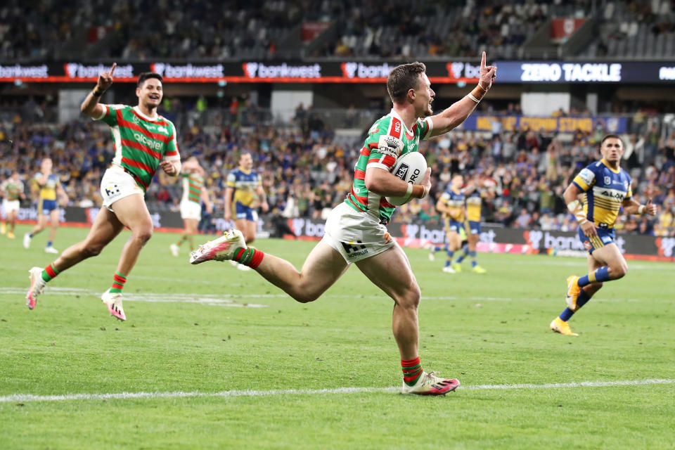 Damien Cook celebrates as he runs in to score a try during the NRL Semi Final match.