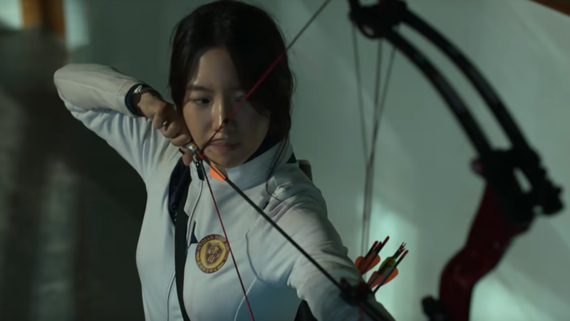 A character from "All Of Us Are Dead" shooting a bow and arrow