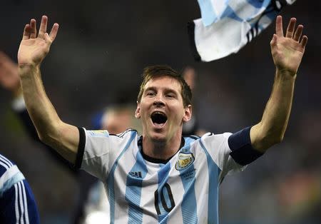 Argentina's Lionel Messi celebrates his team's win over the Netherlands after their 2014 World Cup semi-finals at the Corinthians arena in Sao Paulo July 9, 2014. REUTERS/Dylan Martinez