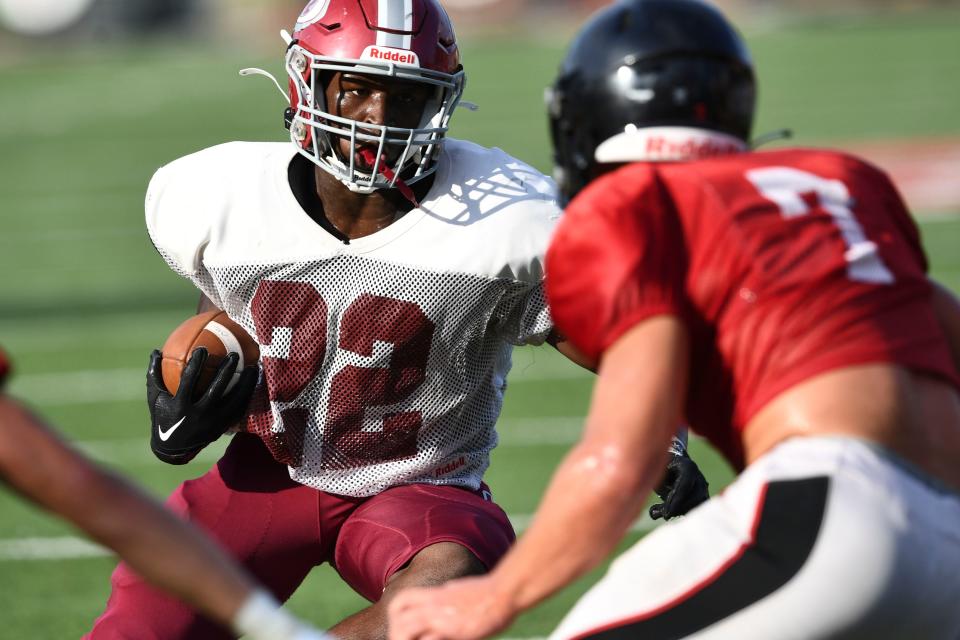 Oak Ridge's De'Jauvis Dozier with the ball during the scrimmage at Maryville on Friday, August 4, 2023.