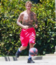 <p>Justin Bieber dons pink shorts and not much else for a Memorial Day run through Beverly Hills. </p>