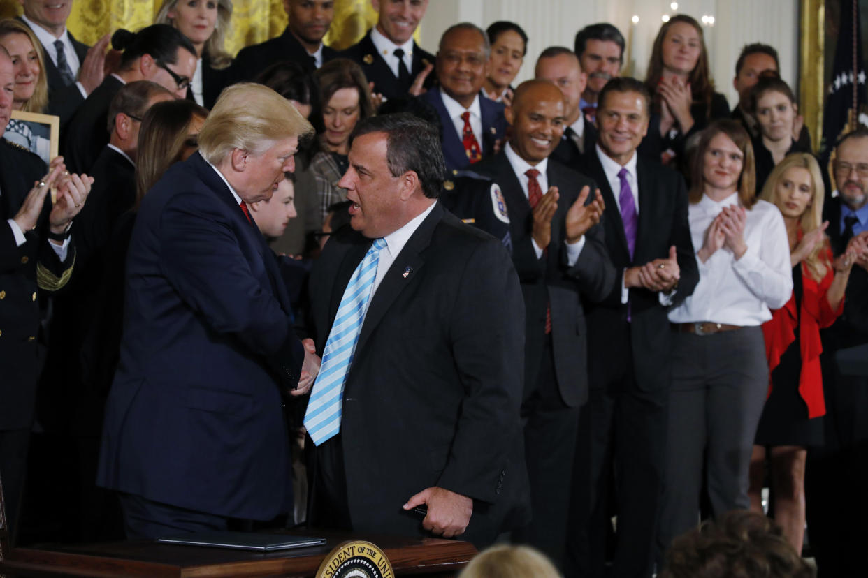 President Trump greets New Jersey Gov. Chris Christie at the White House after speaking about the administration’s plans to combat the nation’s opioid crisis on Oct. 26. (Photo: Carlos Barria/Reuters)