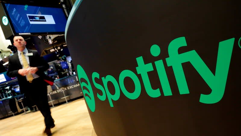 A trading post sports the Spotify logo on the floor of the New York Stock Exchange, Tuesday, April 3, 2018.