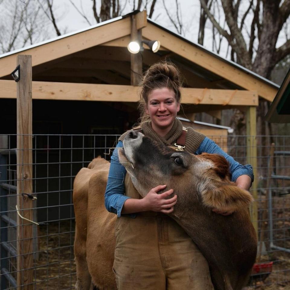 kate st cyr homesteader with cow