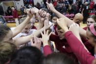 Indiana head coach Teri Moren, center right, talks with the team after they defeated Ohio State in an NCAA college basketball game, Thursday, Jan. 26, 2023, in Bloomington, Ind. (AP Photo/Darron Cummings)