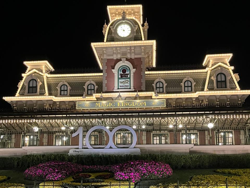 magic kingdom train station lit up at night a magic kingdom in disney world