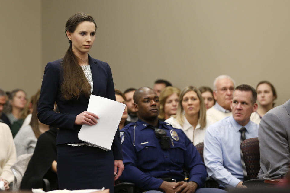 Rachael Denhollander speaks as former Michigan State University and USA Gymnastics doctor Larry Nassar listens to impact statements during the sentencing phase in Ingham County Circuit Court on January 24, 2018 in Lansing, Michigan. More than 100 women and girls accuse Nassar of a pattern of serial abuse dating back two decades, including the Olympic gold-medal winners Simone Biles, Aly Raisman, Gabby Douglas and McKayla Maroney -- who have lashed out at top sporting officials for failing to stop him.    / AFP PHOTO / JEFF KOWALSKY        (Photo credit should read JEFF KOWALSKY/AFP via Getty Images)