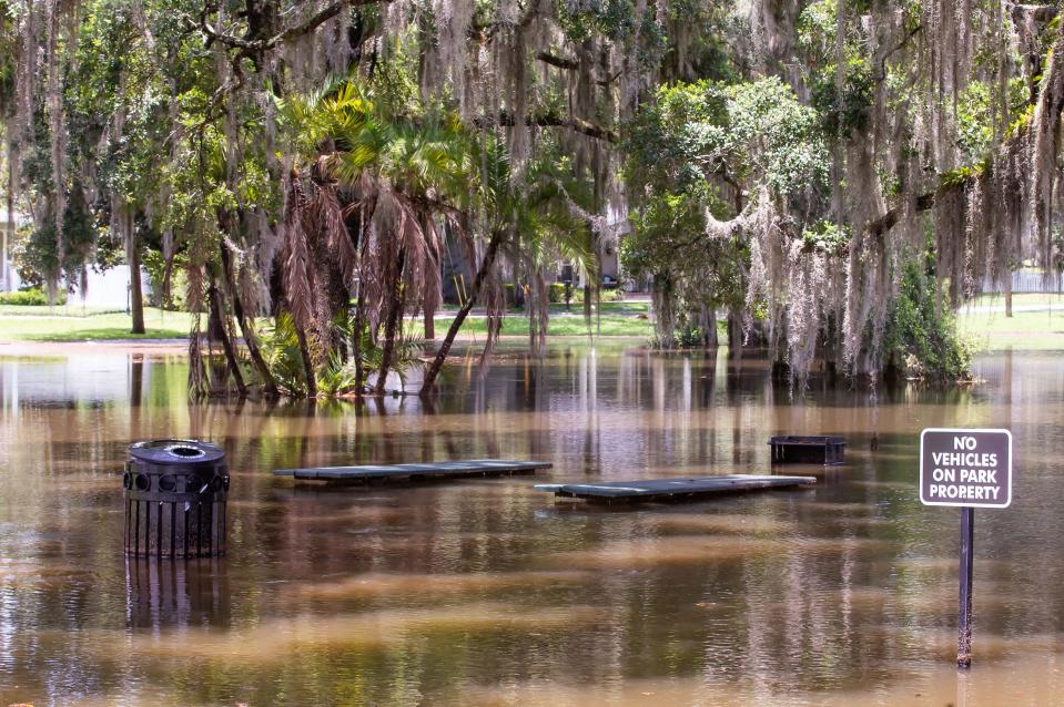 Picnic tables were under water in the flooded Scotty Andrews Park after Ocala on Tuesday.