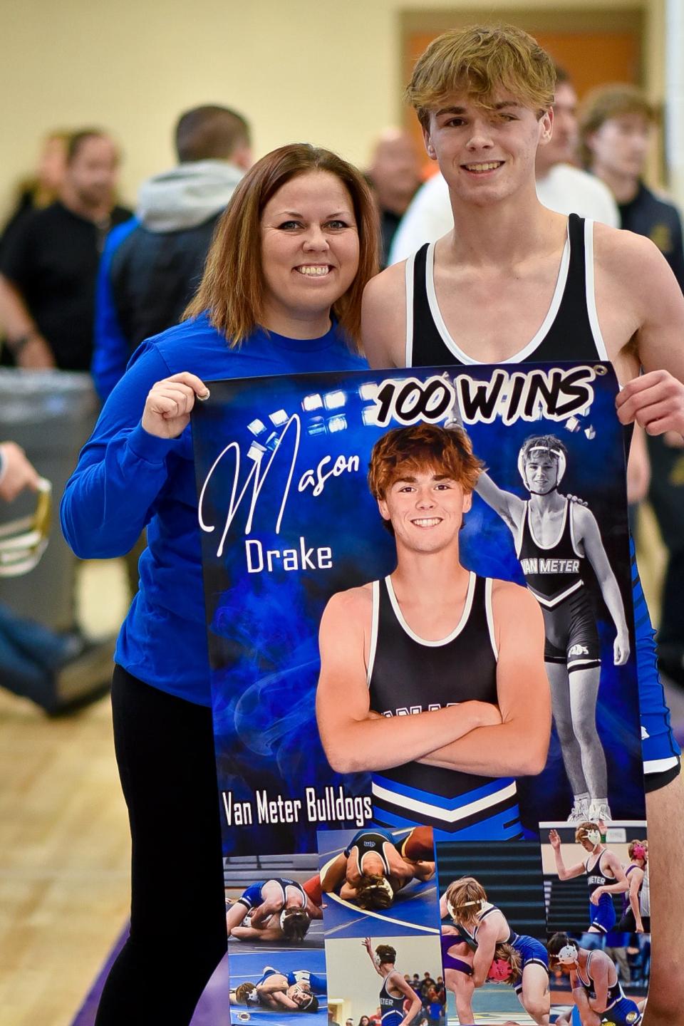 Van Meter's Mason Drake poses for a photo after earning his 100th career varsity win during the West Central Activities Conference tournament on Saturday, Dec. 17, 2022, at West Central Valley.