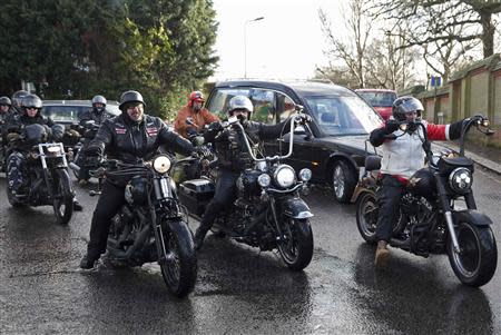 Members of the Hell's Angels motorcycle club arrive for the funeral of Ronnie Biggs in north London January 3, 2014. REUTERS/Neil Hall