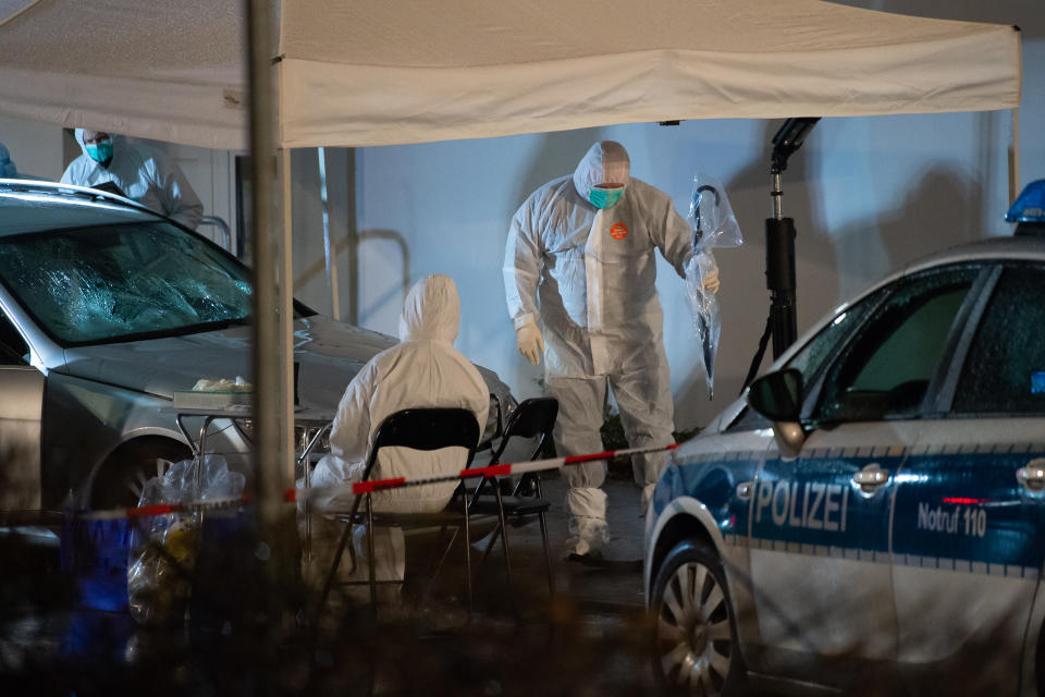 24 February 2020, Hessen, Volkmarsen: Investigating officers are standing by a car that had driven into a crowd of people during a Rose Monday procession. According to Frankfurt police chief Bereswill, 30 people were injured. Seven of them were seriously injured. Photo: Swen Pförtner/dpa (Photo by Swen Pförtner/picture alliance via Getty Images)