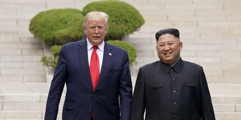 FILE PHOTO: U.S. President Donald Trump meets with North Korean leader Kim Jong Un at the demilitarized zone separating the two Koreas, in Panmunjom, South Korea, June 30, 2019. REUTERS/Kevin Lamarque