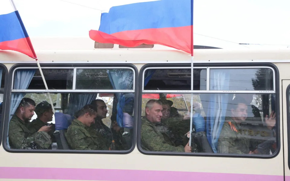 Reservists drafted during the partial mobilisation attend a departure ceremony in Sevastopol, Crimea, on September 27, 2022. - AFP 