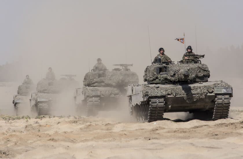 Handout photos of the Polish Defense Ministry shows Leopard 2A4 tanks at the military rest range in Zagan, Poland, May 28, 2015. (Polish Defense Ministry via AP)