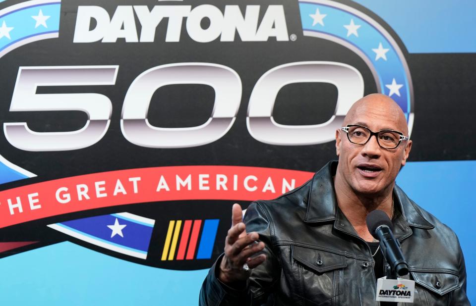 Daytona 500 Grand Marshall Dwayne "The Rock" Johnson speaks during a press conference at Daytona International Speedway, Sunday, Feb. 18, 2024.