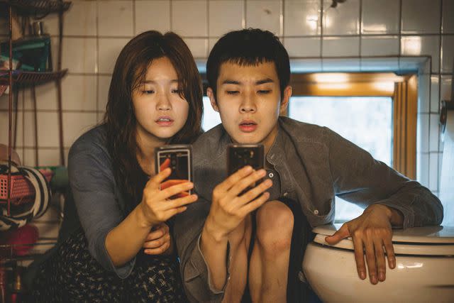 Curzon Artificial Eye/Kobal/Shutterstock Park So-dam and Choi Woo-shik in 'Parasite,' 2019