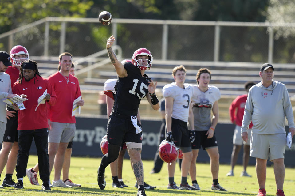 Georgia quarterback Carson Beck (15) does drills as the team prepares for the Orange Bowl NCAA college football game, Wednesday, Dec. 27, 2023, in Miami. Georgia is scheduled to play Florida State in the Orange Bowl Saturday at Hard Rock Stadium in Miami Gardens. (AP Photo/Lynne Sladky)