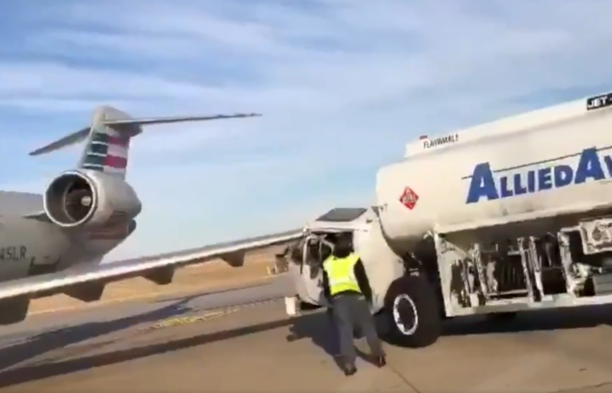 The fuel truck drove into the plane wing: Twitter/@@JasonWhitely