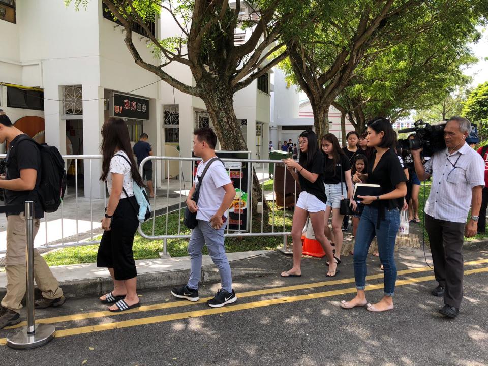 People queueing to pay respects to Aloysius Pang at his memorial on 26 January at Macpherson Lane. (PHOTO: Yahoo Lifestyle Singapore)