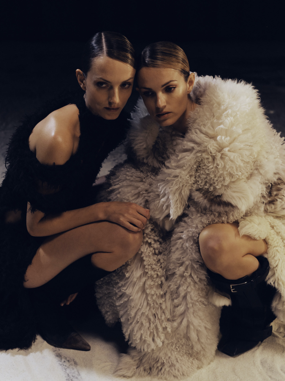 say lou lou pop duo dressed in faux fur kneeling down