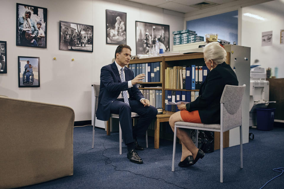 Head of the UN agency for Palestinian refugees Pierre Krahenbuhl, left, speaks during an interview with AP on Thursday, Sept. 27, 2018, in New York. (AP Photo/Andres Kudacki)