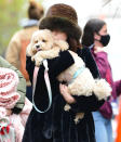 <p>Selena Gomez smooches a dog on her first day of filming the second season of <em>Only Murders in the Building </em>in N.Y.C. on Dec. 6. </p>