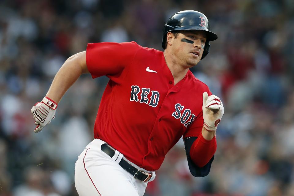 Boston Red Sox's Hunter Renfroe runs on his RBI-double during the first inning of a baseball game against the New York Yankees, Friday, June 25, 2021, in Boston. (AP Photo/Michael Dwyer)