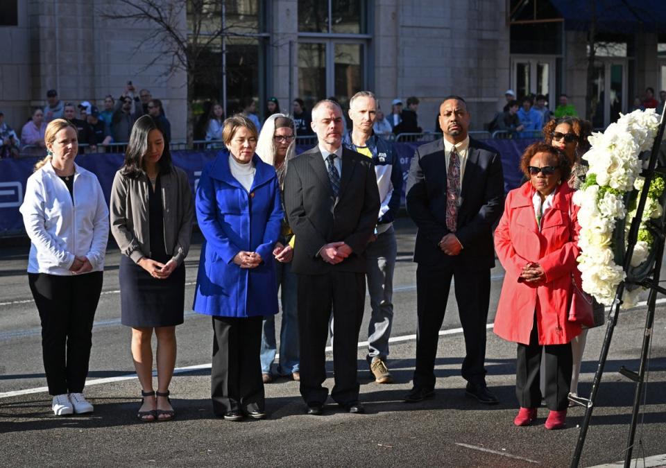 Mayor Michelle Wu, Governor Maura Healey and family members of the Boston Marathon bombing victims lay wreaths at a memorial site on Boylston Street on the eleventh anniversary of the attack (REUTERS)