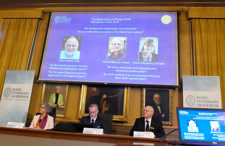 The Nobel Prize laureates for physics 2018 Arthur Ashkin of the United States, Gerard Mourou of France and Donna Strickland of Canada are announced at the Royal Swedish Academy of Sciences in Stockholm, Sweden, October 2, 2018. Hanna Franzen/TT News Agency/via REUTERS