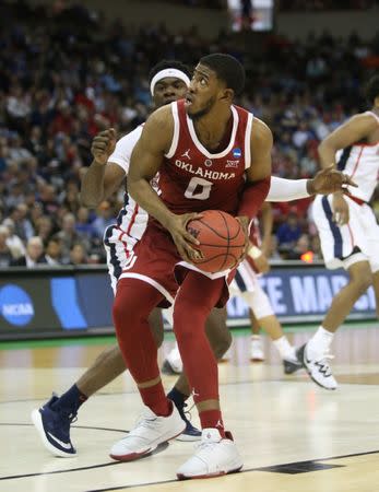 Mar 22, 2019; Columbia, SC, USA; Oklahoma Sooners guard Christian James (0) goes up for a shot during the second half against the Mississippi Rebels in the first round of the 2019 NCAA Tournament at Colonial Life Arena. Mandatory Credit: Jeff Blake-USA TODAY Sports