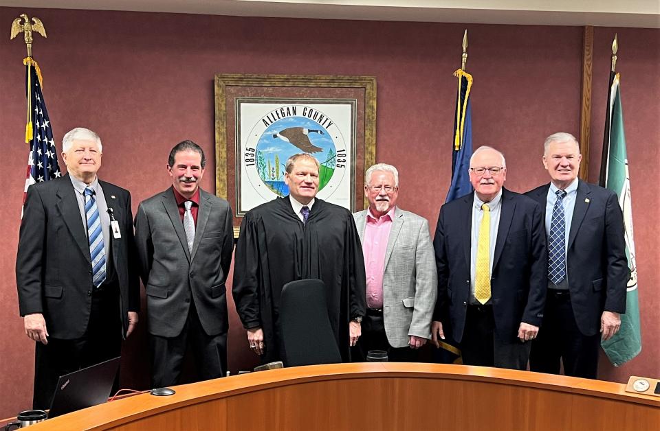 The Allegan County Board of Commissioners and Judge Roberts Kengis stand for a picture on Thursday, Jan. 5, 2023. From left: Gale Dugan, Scott Beltman, Kengis, Mark DeYoung, Jim Storey and Dean Kapenga.