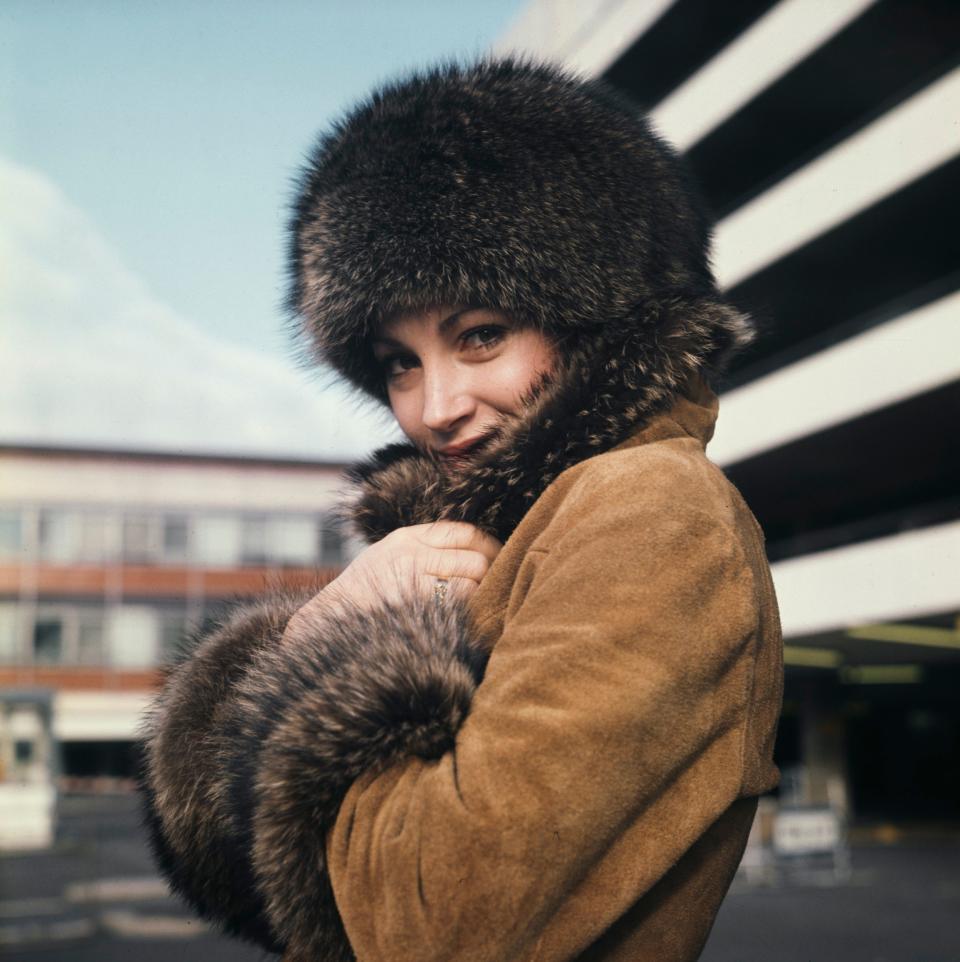 Fancy playing Solitaire?: Jane Seymour leaving Heathrow for the Bond shoot, 1972