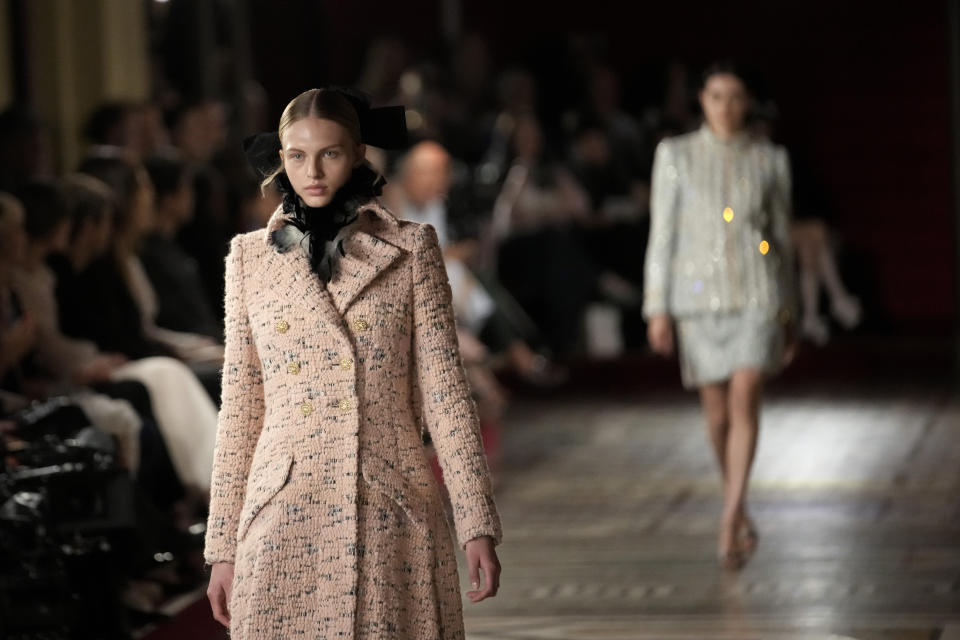 A model wears a creation for the Chanel Haute Couture Fall-Winter 2024-2025 collection presented Tuesday, June 25, 2024 in Paris. (AP Photo/Christophe Ena)