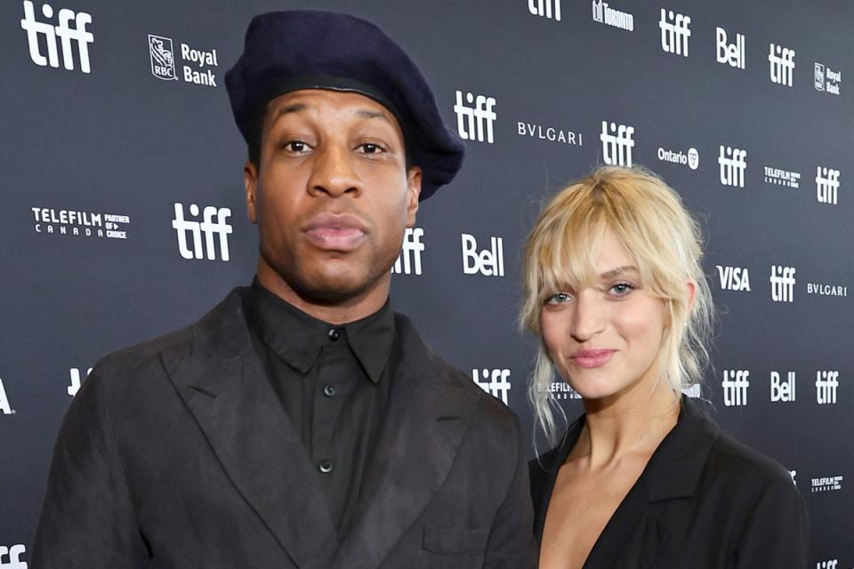 Jonathan Majors and guest Grace Jabbari attend the “Devotion” Premiere at Cinesphere in September 2022 in Toronto (Getty)