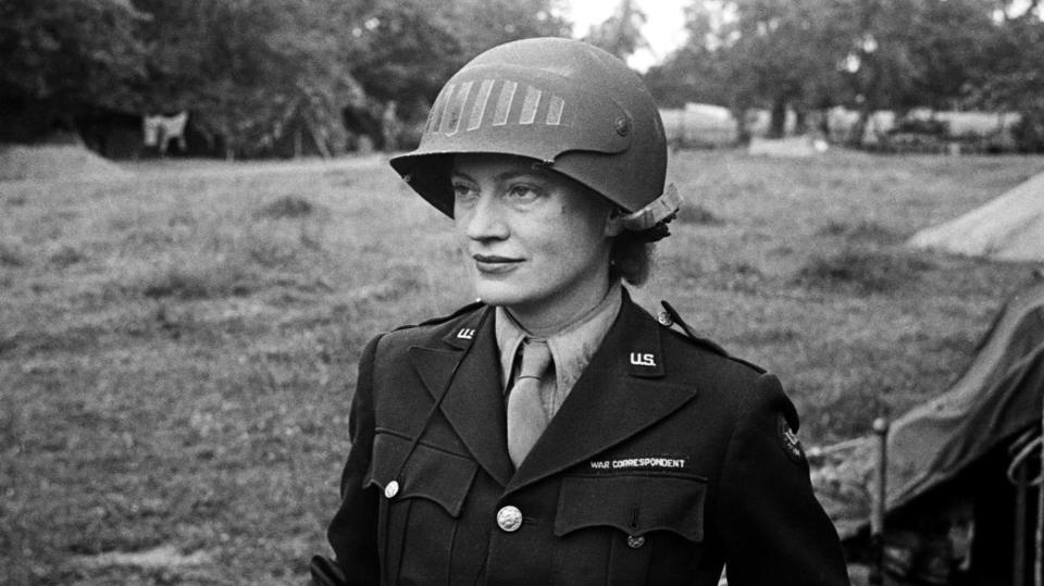 Lee Miller in steel helmet specially designed for using a camera, Normandy, France 1944 by unknown photographer Photographer Unknown © The Penrose Collection, England 2015. All rights reserved.