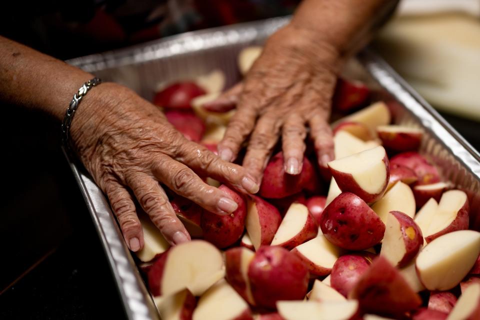 Norma Thornton prepares a meal that she will distribute to homeless people in Bullhead City, Ariz,. on Tuesday, Oct. 24, 2023. | Spenser Heaps, Deseret News