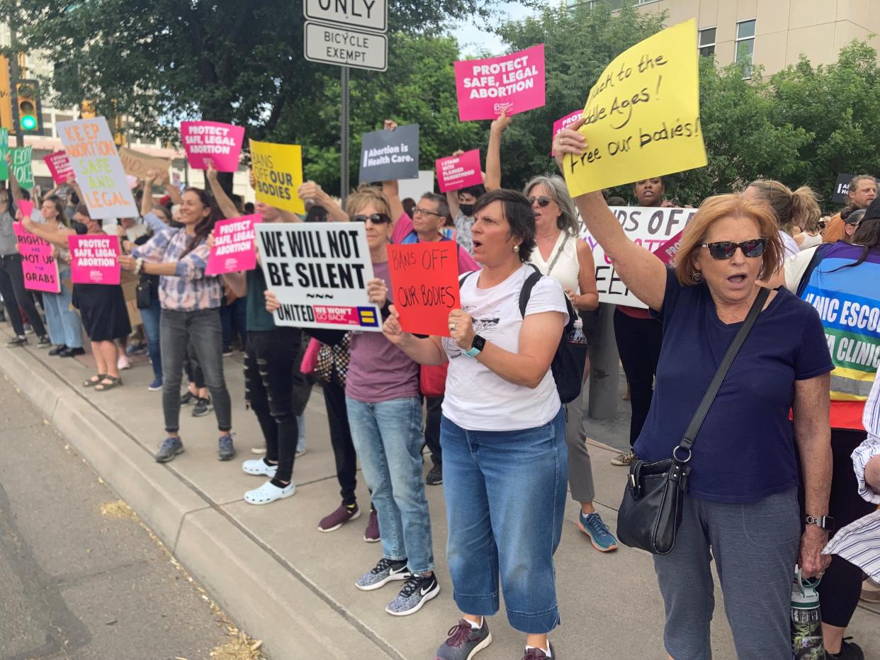 People rallied in front of the Deconcini U.S. Courthouse in Tucson in support of abortion rights in light of the possible repeal of Roe v. Wade