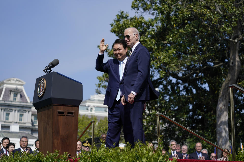 President Joe Biden stands with South Korea's President Yoon Suk Yeol during a State Arrival Ceremony on the South Lawn of the White House, Wednesday, April 26, 2023, in Washington. (AP Photo/Evan Vucci)