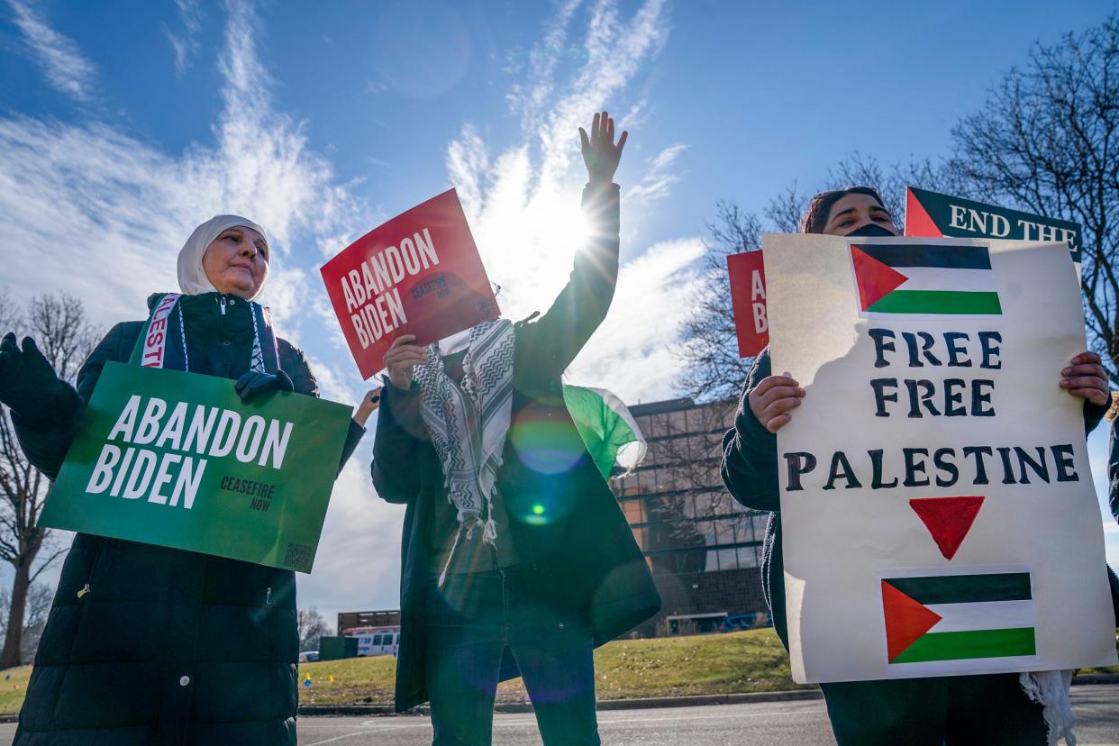 A protest calling for a cease-fire in Gaza unfolds near the parking lot of the The Henry Hotel in Dearborn as government officials with the Biden administration plan to meet with community leaders in Dearborn on Thursday, Feb. 8, 2024.