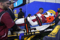 Arizona Cardinals safety Budda Baker is carted off the field during the second half of an NFL wild-card playoff football game against the Los Angeles Rams in Inglewood, Calif., Monday, Jan. 17, 2022. (AP Photo/Mark J. Terrill)