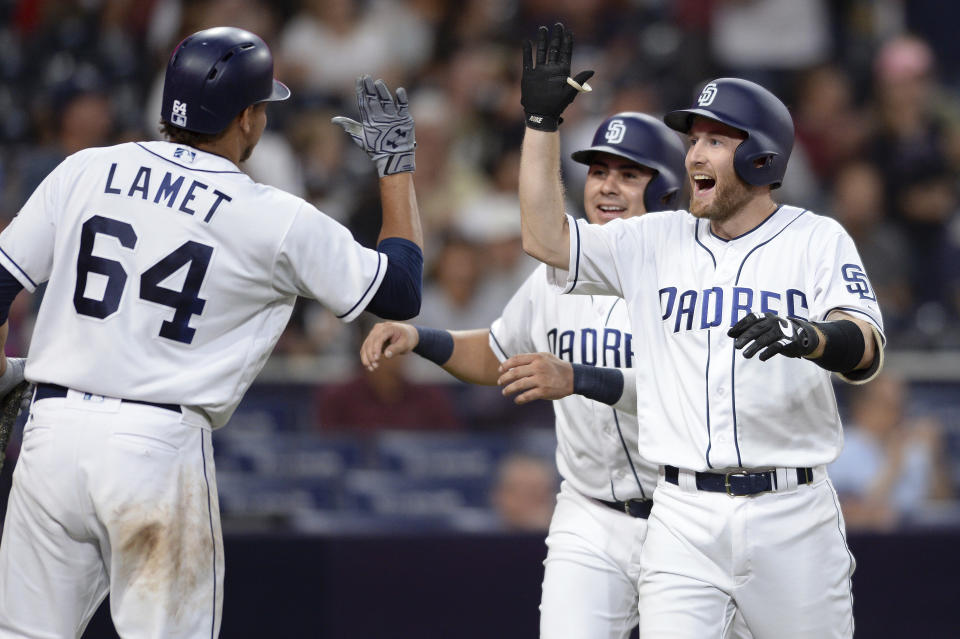 Padres' rookie Rocky Gale (far right) is congratulated at home plate after hitting his first career home run against Arizona. (AP)